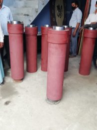 High-Tonnage Red Industrial Cylinders.